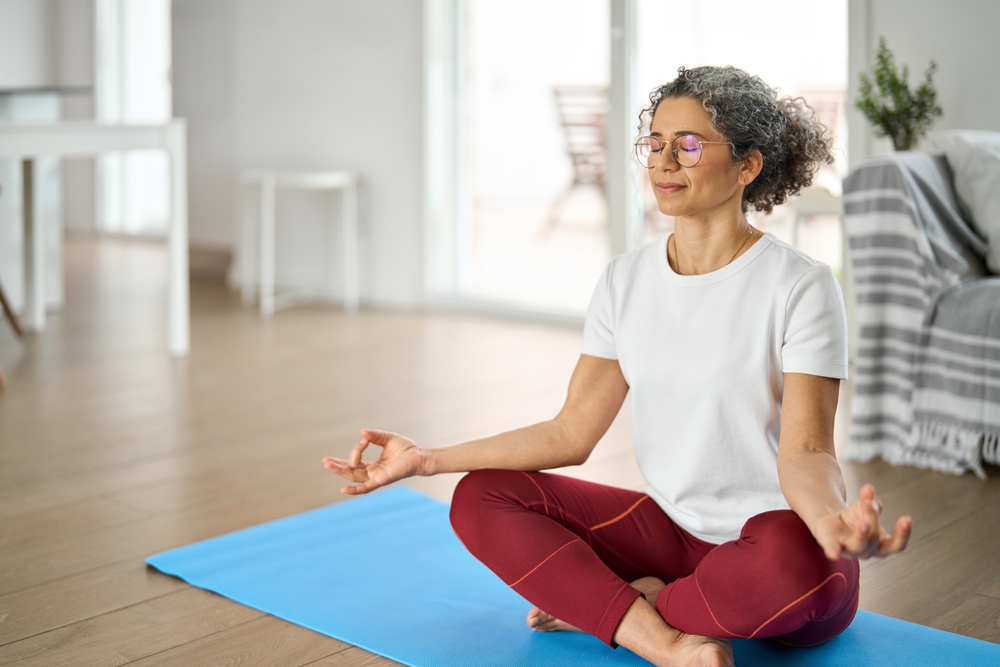 Happy,Healthy,Middle,Aged,Woman,Meditating,At,Home.,Serene,Mindful